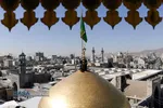 آیین تعویض پرچم گنبد منور رضوی در روز میلاد امام رضا(علیه&zwnj;السلام)