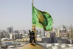 آیین تعویض پرچم گنبد منور رضوی در روز میلاد حضرت امام رضا (علیه&zwnj;السلام)
