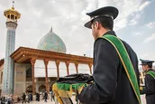 پرچم گنبد حرم شاهچراغ تعویض شد