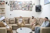 دیدار آیت الله اعرافی با خانواده شهید دهشیری