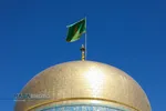 آیین تعویض پرچم گنبد منور رضوی در روز میلاد امام رضا(علیه&zwnj;السلام)