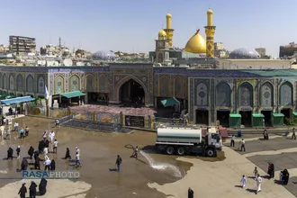 تنظیف گنبد و محیط پیرامونی حرم مطهر حضرت ابالفضل (ع) در آستانه محرم