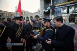 آیین تعویض پرچم گنبد مطهر حرم حضرت فاطمه معصومه (سلام&zwnj;الله&zwnj;علیها)