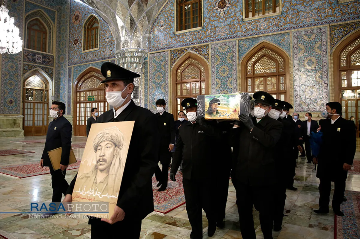 وداع با پیکر شهید نسیم افغانی در حرم مطهر رضوی&lrm;