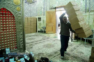 بسته بندی و توزیع ۱۵۰۰ بسته اقلام غذایی و بهداشتی در میان نیازمندان قم