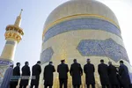 آیین تعویض پرچم گنبد منور رضوی در روز میلاد حضرت امام رضا (علیه&zwnj;السلام)