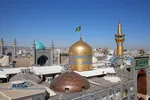 آیین تعویض پرچم گنبد منور رضوی در روز میلاد امام رضا(علیه&zwnj;السلام)