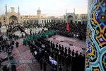 آیین تعویض پرچم گنبد مطهر حرم حضرت فاطمه معصومه (سلام&zwnj;الله&zwnj;علیها)