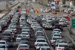 تست تب سنجی توسط جمعیت هلال احمر در خروجی تهران&lrm;