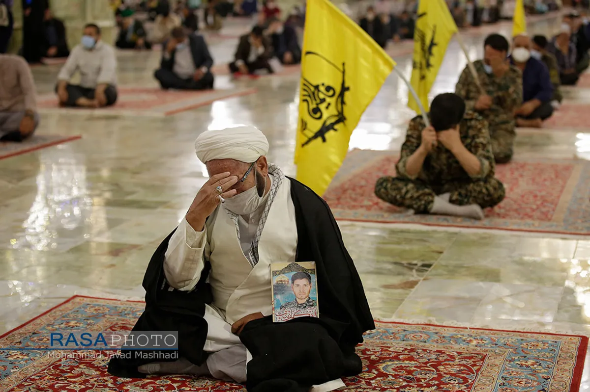 وداع با پیکر شهید نسیم افغانی در حرم مطهر رضوی&lrm;