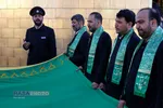 آیین تعویض پرچم گنبد منور رضوی در روز میلاد امام رضا(علیه&zwnj;السلام)