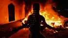 Iraq announces curfew in Najaf after masked assailants torch Iran consulate