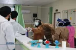 عیادت بیماران و توزیع مواد ضدعفونی کننده در میان بیماران و کادر درمانی