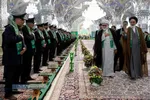 آیین تعویض پرچم گنبد منور رضوی در روز میلاد امام رضا(علیه&zwnj;السلام)