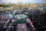 آیین تعویض پرچم گنبد مطهر حرم حضرت فاطمه معصومه (سلام&zwnj;الله&zwnj;علیها)