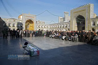تشییع پیکر جانباز شهید حاج قربان نیک رفتار در حرم مطهر رضوی