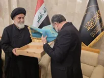اهدای پرچم متبرک مسجد جمکران به تولیت آستان مقدس کاظمین