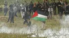 Palestinian teen killed, scores injured by Israeli forces in Gaza protests